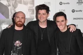 The Script guitarist Mark Sheehan (left) died at the age of 46 following a brief illness. (Credit: Getty Images)