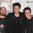 The Script guitarist Mark Sheehan (left) died at the age of 46 following a brief illness. (Credit: Getty Images)