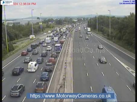 Traffic queuing on the M6 in Lancashire this afternoon after a caravan overturned Picture:Motorwaycameras.co.uk
