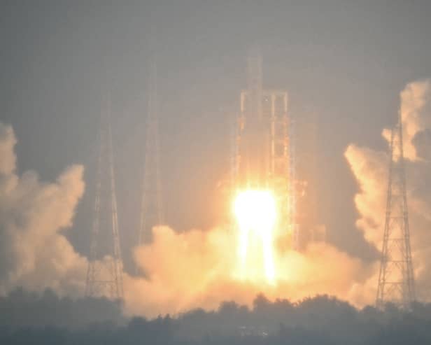 The Long March 5 rocket carrying the Chang'e-6 mission lunar probe lifts off on 3 May (Photo: HECTOR RETAMAL/AFP via Getty Images)