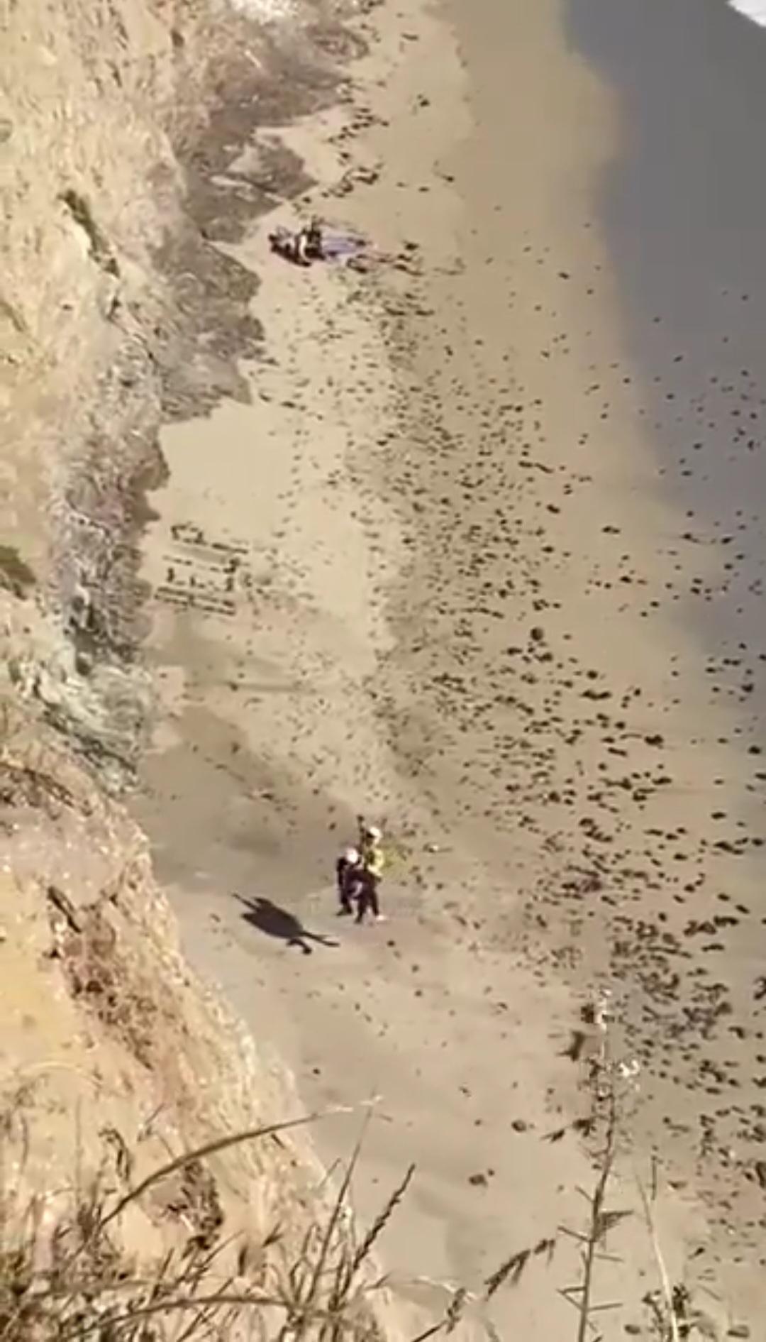 Surfer rescued from beach by helicopter after spelling “Help” on the ...