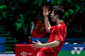 Shi Yu Qi celebrates after winning the Men's Singles title