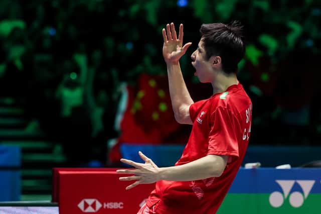 Shi Yu Qi celebrates after winning the Men's Singles title