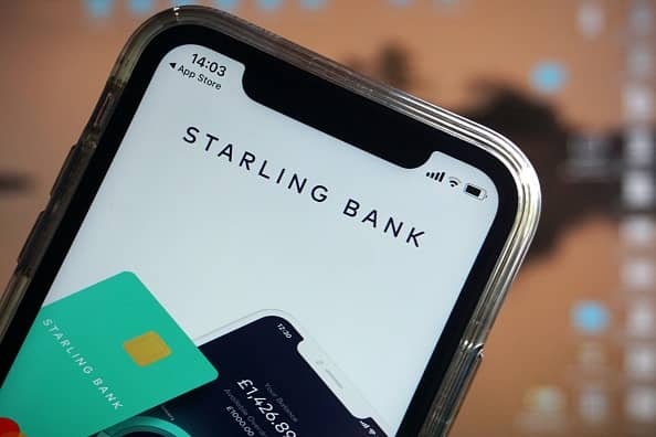 Digital challenger bank Starling has reported a 25% drop in annual profits after a turbulent year.