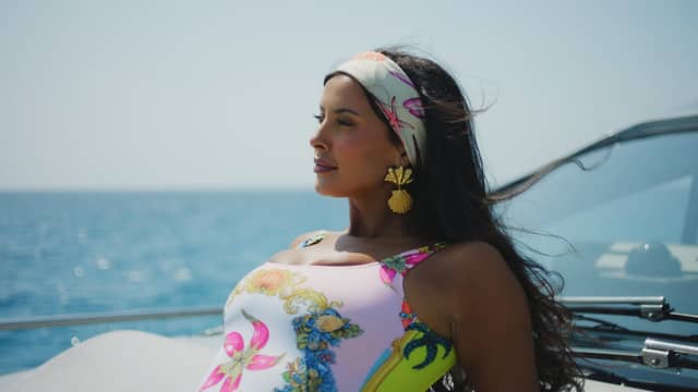Love Island has just started, but Maya Jama has already stolen the show. Here she is in vintage Versace. Photo: ITV