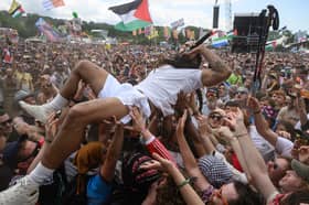 Bobby Vylan crowdsurfs during the Glastonbury festival.
