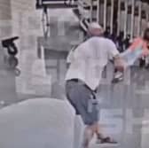 Man slams boy on the floor at Sheremetyevo Airport, Russia, undated. Relatives of the man who threw the two-year-old child have said he did not intend to attack. (Newsflash/NX)