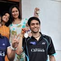 Badminton stars Saina Nehwal and husband  Parupalli Kashyap split after nearly seven years of marriage. Indian badminton medalists Saina Nehwal (L) with gold, Parapulli Kashyap with bronze (R) and the women's doubles gold medalists Ashwini Ponnappa and Jwala Gutta (C) pose with coach P.Gopichand (top-L) prior to a press conference in Hyderabad on October 16, 2010. Photo: Getty Images