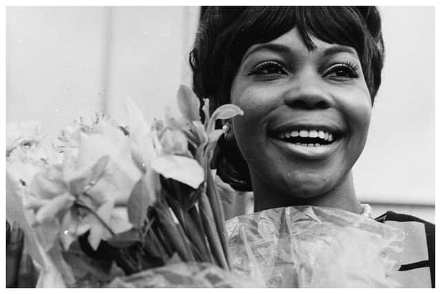 Beloved actress Marlene Warfield dies at the age of 83. Portrait of American actress Marlene Warfield, receiving a bouquet of flowers as she arrives at London Airport, June 23rd 1968. (Photo by Jim Gray/Keystone/Getty Images)