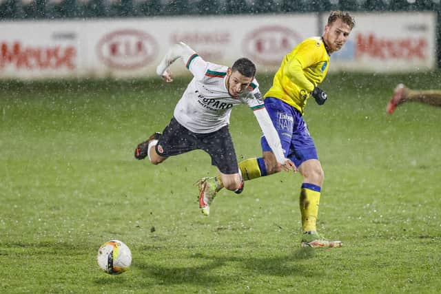 Tragedy as footballer Matthias Verreth 's 14-month old son dies and club cancels pre-season training camp. Virton's Ayyoub Allach and Waasland-Beveren's Matthias Verreth fight for the ball during a soccer match between Royal Excelsior Virton and Waasland-Beveren, Friday 26 November 2021 in Virton, on day 13 of the '1B Pro League' second division of the Belgian soccer championship. BELGA PHOTO BRUNO FAHY (Photo by BRUNO FAHY/BELGA MAG/AFP via Getty Images)