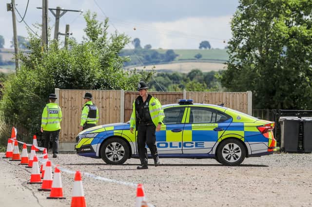Police at Stathern Lodge in Leicestershire yesterday after the suspected poisoning at a summer camp