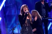Kelly Clarkson has postponed a series of shows in her Las Vegas residency after he ex-husband fell ill.