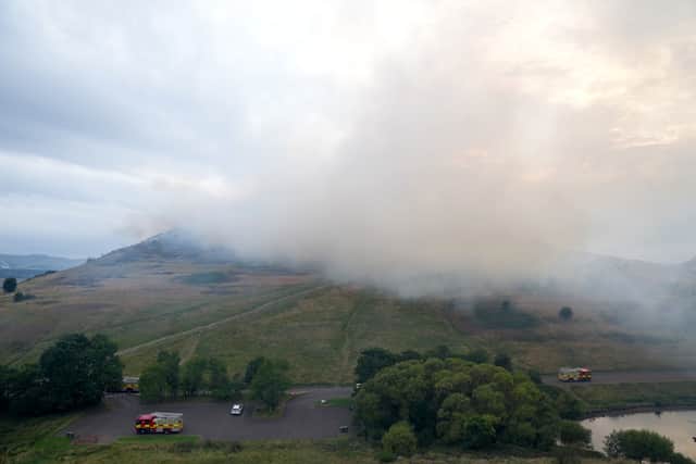 Firefighters remain on the scene tackling a blaze at a famous landmark in Edinburgh, Scotland. (Photo: Getty Images)