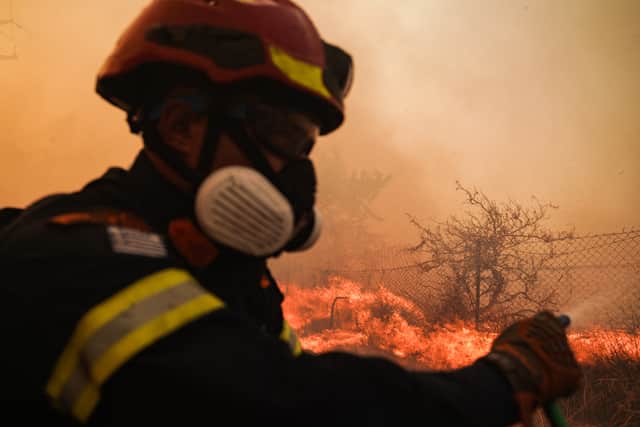 More than 100 wildfires have broke out across Greece with the most severe fires raging in Achaia, Zante, Kefalonia and Chios. (Photo: SOOC/AFP via Getty Images)