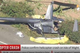 A screengrab taken from Sky News of a helicopter that crashed on the Isle of Wight