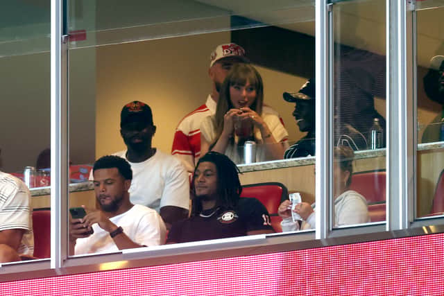 Taylor and Travis looked cosy during their first public appearance since their engagement announcement.