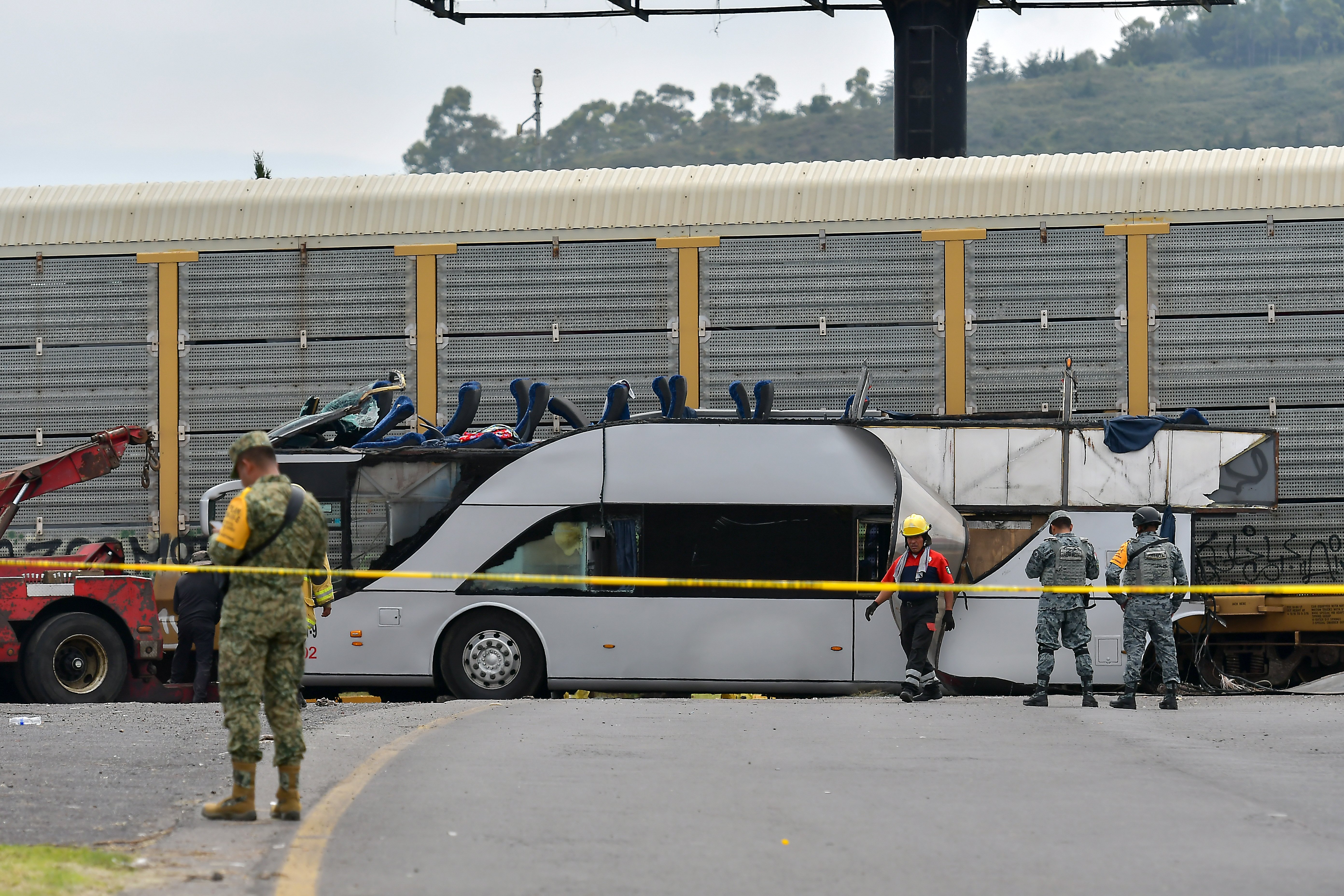 Video shows freight train smashing into bus in Mexico