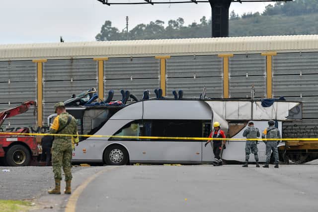 Video shows freight train smashing into bus in Mexico