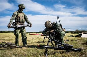 Soldiers take part in a large-scale airborne assault exercise in the Netherlands, involving 500 fully equipped military paratroopers of various Nato nations this week 