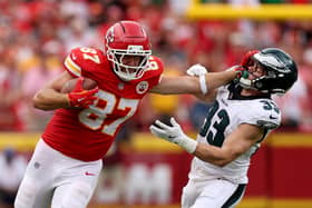 KANSAS CITY, MISSOURI - SEPTEMBER 14: Travis Kelce #87 of the Kansas City Chiefs stiff arms Cooper DeJean #33 of the Philadelphia Eagles during the third quarter in the game at Arrowhead Stadium on September 14, 2025 in Kansas City, Missouri. (Photo by Jamie Squire/Getty Images)