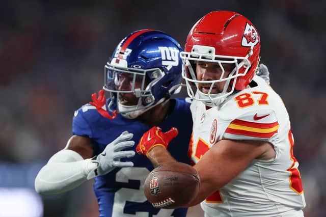 Tyler Nubin of the New York Giants breaks up a pass to Travis Kelce, number 87 of the Kansas City Chiefs, during the first quarter at MetLife Stadium on September 21, 2025 in East Rutherford, New Jersey