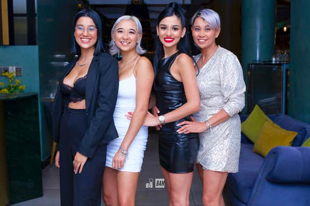 From left, Connor, Storm, Cassidy Moodley and their mother Janene