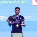 An Se Young holding the trophy at the YONEX All England 2025