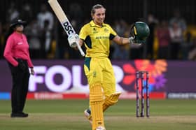 Ash Gardner of Australia celebrates her century during the 2025 ICC Women's Cricket World Cup match between Australia and New Zealand at Holkar Cricket Stadium on October 01, 2025 in Indore, India