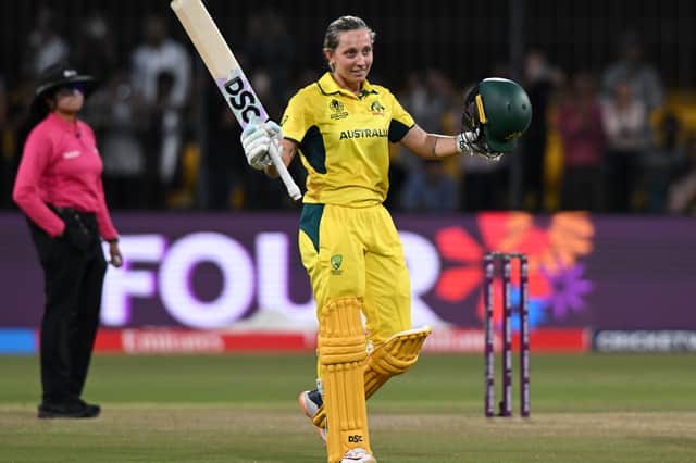 Ash Gardner of Australia celebrates her century during the 2025 ICC Women's Cricket World Cup match between Australia and New Zealand at Holkar Cricket Stadium on October 01, 2025 in Indore, India