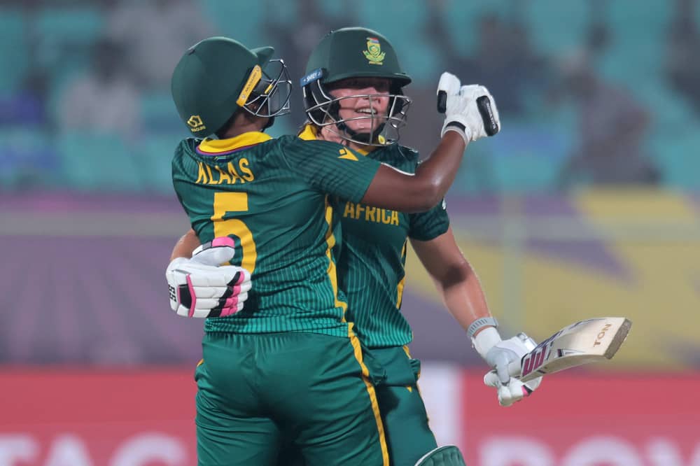 Nadine De Klerk of South Africa celebrates victory with Masabata Klaas after hitting the winning runs