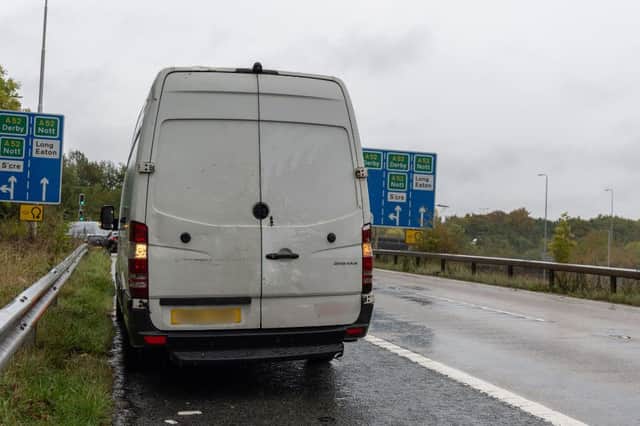The white van that was pulled over by police after its driver made obscene hand gestures to undercover cops on the M1