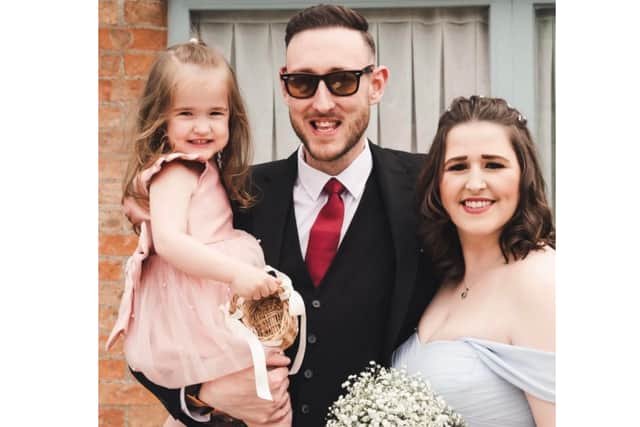 Brett Harman with his fiancée Hannah and their daughter Summer