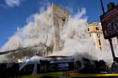 Emergency services rushed to Italy’s capital Rome after the partial collapse of a medieval tower near the Colosseum. (Photo: AFP via Getty Images)