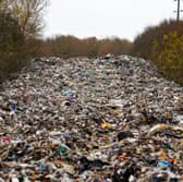 Shocking pictures show Britain's biggest ever fly tip - a pile of waste 500FT long dumped in one go. The massive heap of hazardous rubbish stretches 150m and is around 20ft (6m) deep. It was illegally dumped in a field next to the A34 and River Cherwell near Kidlington in Oxfordshire. The waste was left in one go and described by an MP as "threatening an environmental disaster"
