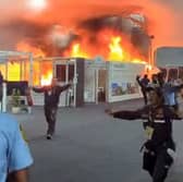 AFPTV video footage shows emergency crews battling a fire that broke out at a pavilion inside the venue of the COP30 UN Climate Change Conference in Belem, Para state, Brazil