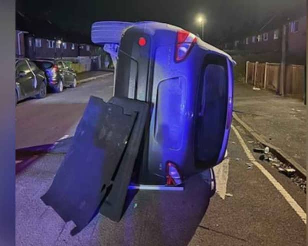 A car flipped in Woodfield Road, Broxtowe, Nottinghamshire, after having reportedly hit several other cars