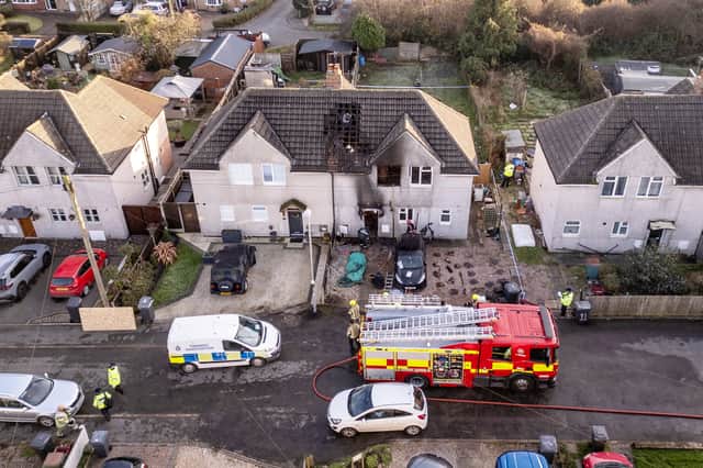 The scene of the house fire on Holywell Avenue in Ashby-de-la Zouch, Leicestershire on Friday, November 21