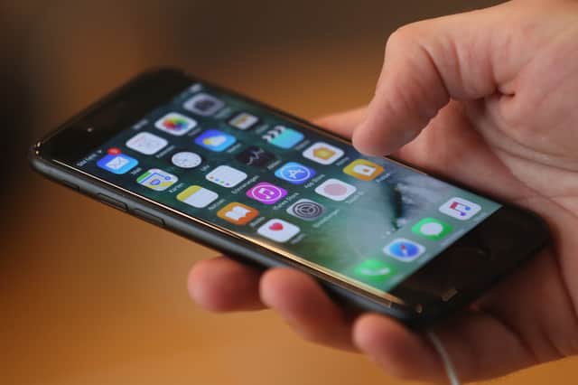 Apple has issued an urgent security warning to anyone with an iPhone. (Picture: Sean Gallup)