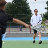 Tennis legend Andy Murray visited a redeveloped court in West Byfleet, Surrey alongside children from West Byfleet Junior School in June.