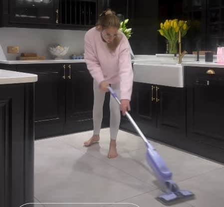 Stacey Solomon using the Shark VacMop 2-in-1 Cordless Hard Floor Vacuum Spray Mop. Photo by Instagram/Stacey Solomon.