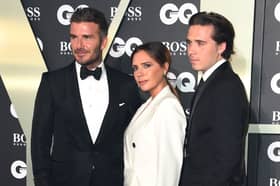 David Beckham (left), Victoria Beckham and Brooklyn Beckham arriving at the GQ Men of the Year Awards 2019