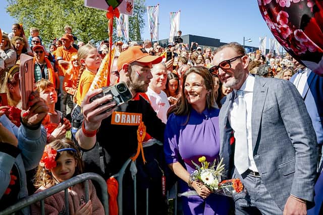 Prince Bernhard and Princess Annette of Orange-Nassau of the Netherlands to divorce after 25 years of marriage. Netherlands' Prince Bernhard Jr. (R) and his wife Princess Annette pose with onlookers during King's Day celebrations in Doetinchem on April 26, 2025. (Photo by PATRICK VAN KATWIJK/ANP/AFP via Getty Images)