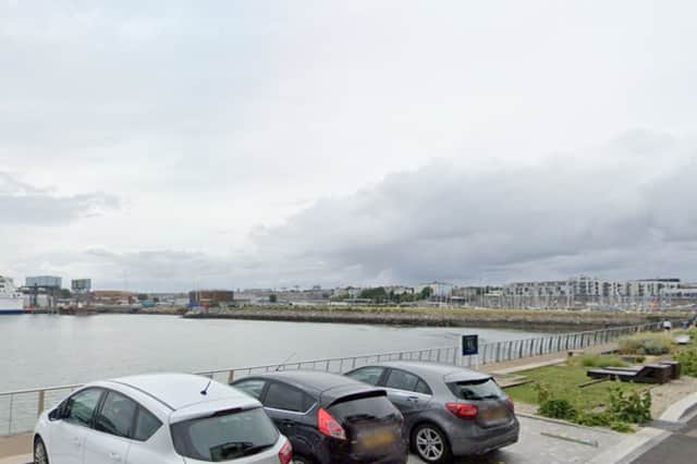 Teenager arrested for murder after body found in water at marina