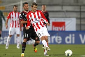 Italian footballer Nicolas Giani, right, has died age 39.
