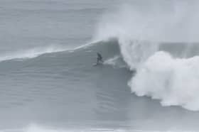 Surfers riding waves up to 30ft tall in Newquay