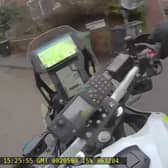 The dramatic moment police knock a suspect from his motorbike
