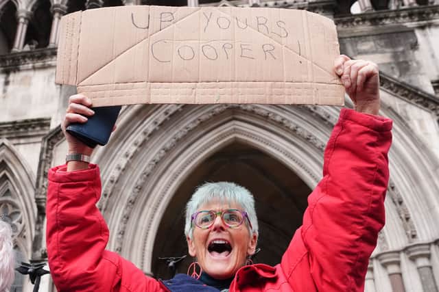 Protesters celebrate outside the High Court, central London, where Dame Victoria Sharp, Mr Justice Swift and Mrs Justice Steyn have ruled in favour of Palestine Action's co-founder Huda Ammori's challenge over the ban of the organisation as a terror group.