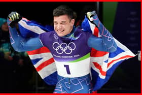 Great Britain's Matt Weston celebrates after winning the gold medal in the Men's Skeleton at the Cortina Sliding Centre, on day seven of the Milano Cortina 2026 Winter Olympics, Italy. 