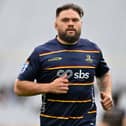 Angus Ta'avao of the Highlanders warms up prior to the round one Super Rugby match between Highlanders and Crusaders at Forsyth Barr Stadium