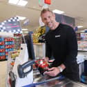 F1 World Champion Jenson Button took on shop assistants in a high-octane ‘Scan Grand Prix’.